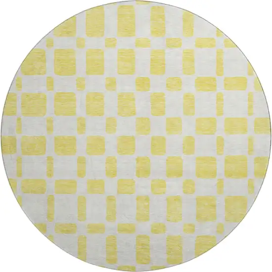 8' Yellow And Beige Geometric Washable Round Rug With UV Protection Photo 1