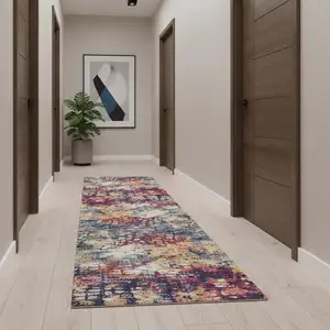 Photo of 11' Yellow And Blue Abstract Runner Rug