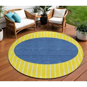 Photo of 8' Yellow And Blue Round Striped Washable Indoor Outdoor Area Rug