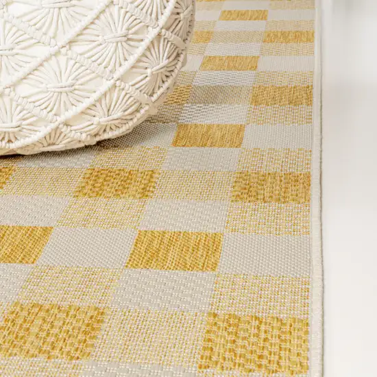 8' Yellow And Cream Geometric Indoor Outdoor Runner Rug Photo 9