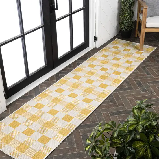 8' Yellow And Cream Geometric Indoor Outdoor Runner Rug Photo 3