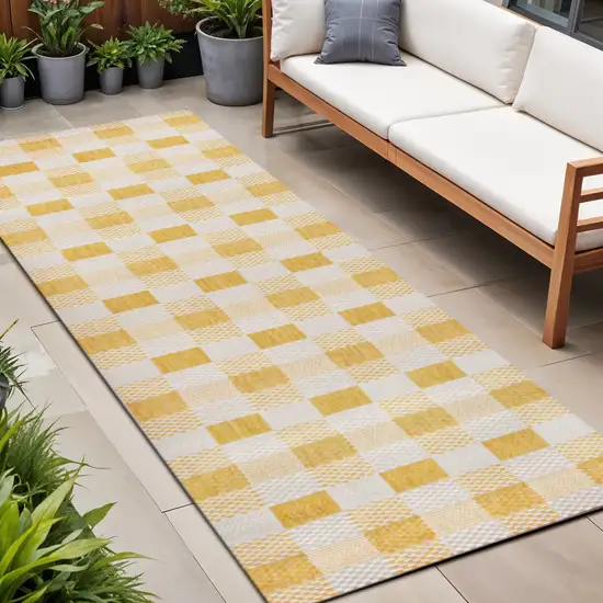 8' Yellow And Cream Geometric Indoor Outdoor Runner Rug Photo 1