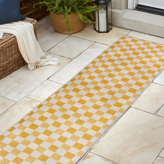 8' Yellow And Cream Geometric Indoor Outdoor Runner Rug Photo 4