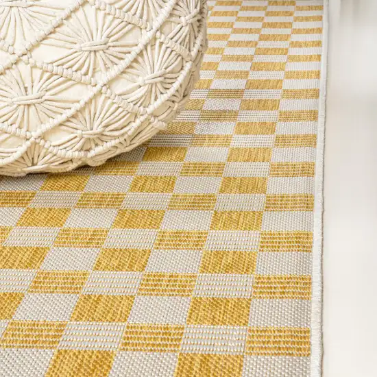 8' Yellow And Cream Geometric Indoor Outdoor Runner Rug Photo 9