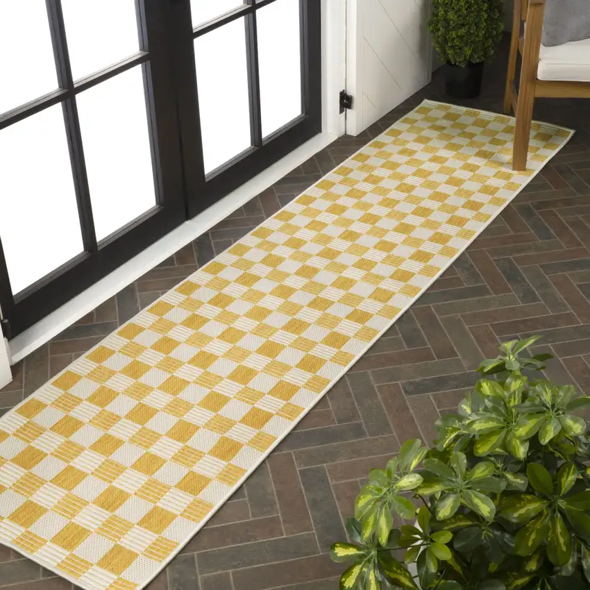 8' Yellow And Cream Geometric Indoor Outdoor Runner Rug Photo 3