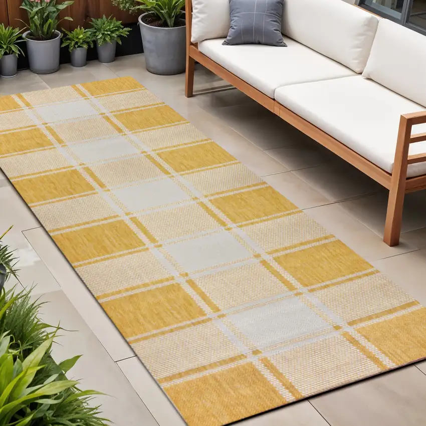 8' Yellow And Cream Gingham Indoor Outdoor Runner Rug Photo 1