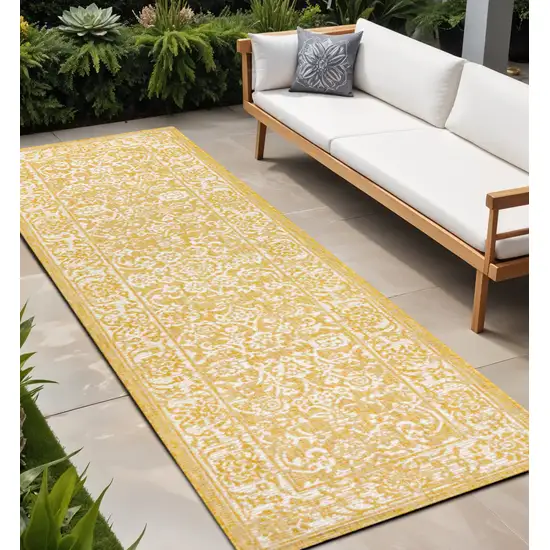 10' Yellow And Cream Medallion Indoor Outdoor Runner Rug Photo 1