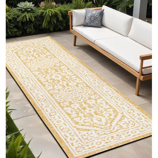 8' Yellow And Cream Medallion Indoor Outdoor Runner Rug Photo 1
