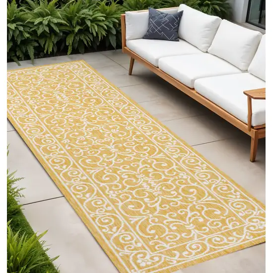 10' Yellow And Cream Medallion Indoor Outdoor Runner Rug Photo 1