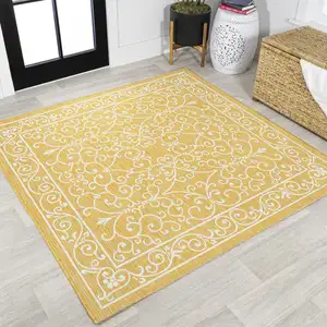 Photo of 5' Yellow And Cream Square Medallion Indoor Outdoor Area Rug