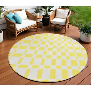 Photo of 8' Yellow And Gray Round Geometric Washable Indoor Outdoor Area Rug