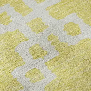 Photo of 8' Yellow And Ivory Abstract Geometric Washable Round Rug With UV Protection