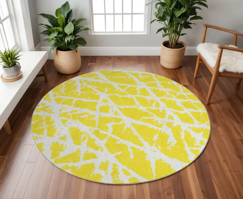 8' Yellow And Ivory Abstract Washable Round Rug With UV Protection Photo 2