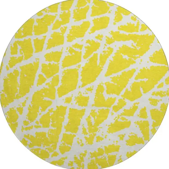 8' Yellow And Ivory Abstract Washable Round Rug With UV Protection Photo 4