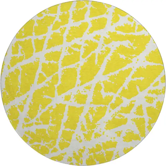 8' Yellow And Ivory Abstract Washable Round Rug With UV Protection Photo 1