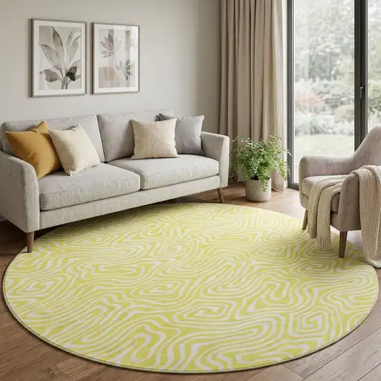 8' Yellow And Ivory Abstract Washable Round Rug With UV Protection Photo 1