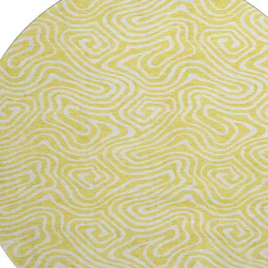 8' Yellow And Ivory Abstract Washable Round Rug With UV Protection Photo 2