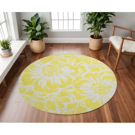 8' Yellow And Ivory Floral Washable Round Rug With UV Protection Photo 2