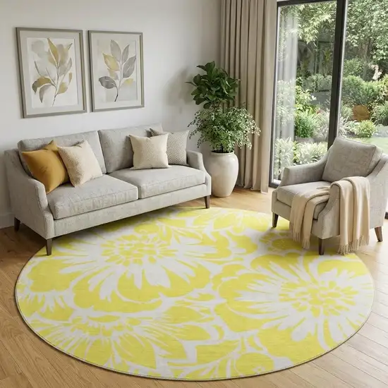 8' Yellow And Ivory Floral Washable Round Rug With UV Protection Photo 1