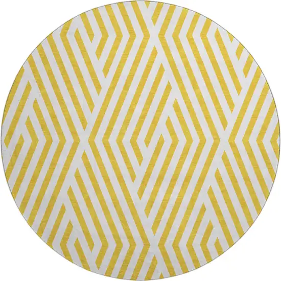 8' Yellow And Ivory Geometric Washable Round Rug With UV Protection Photo 1