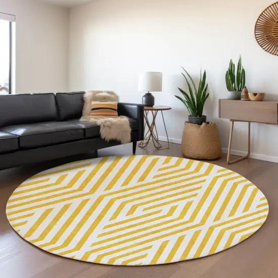 8' Yellow And Ivory Geometric Washable Round Rug With UV Protection Photo 5
