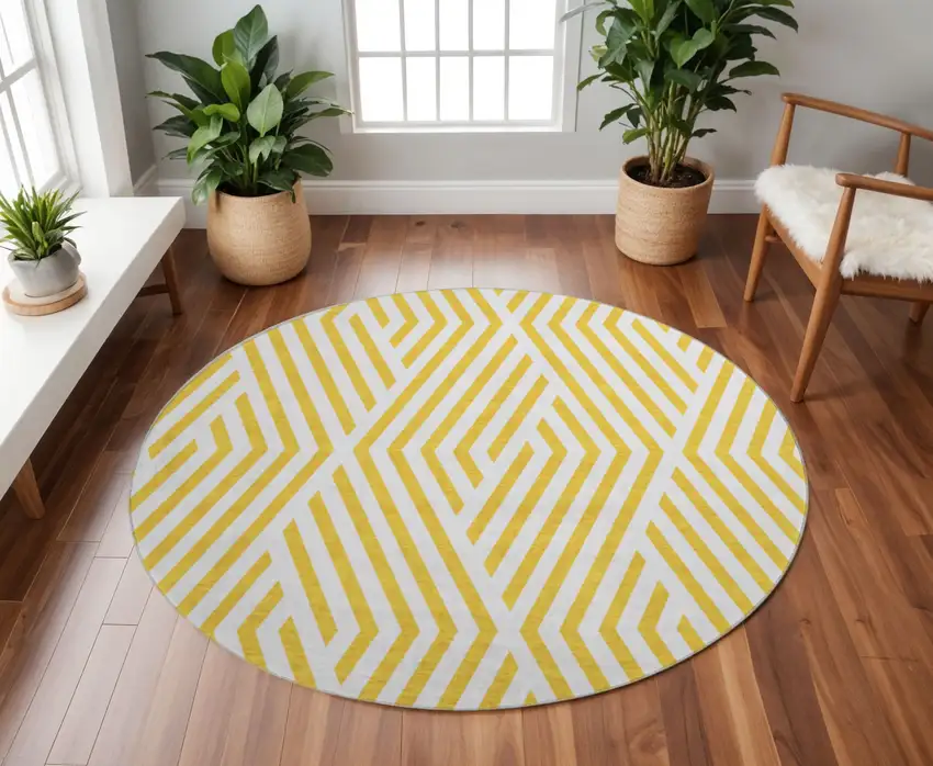 8' Yellow And Ivory Geometric Washable Round Rug With UV Protection Photo 2