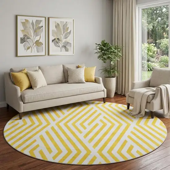 8' Yellow And Ivory Geometric Washable Round Rug With UV Protection Photo 1