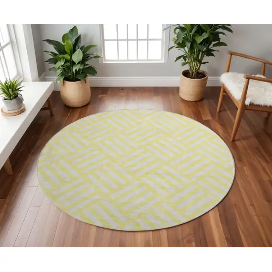 8' Yellow And Ivory Geometric Washable Round Rug With UV Protection Photo 2