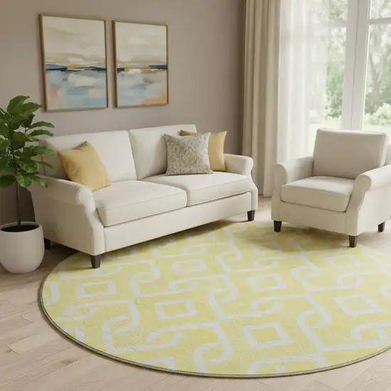 8' Yellow And Ivory Geometric Washable Round Rug With UV Protection Photo 1
