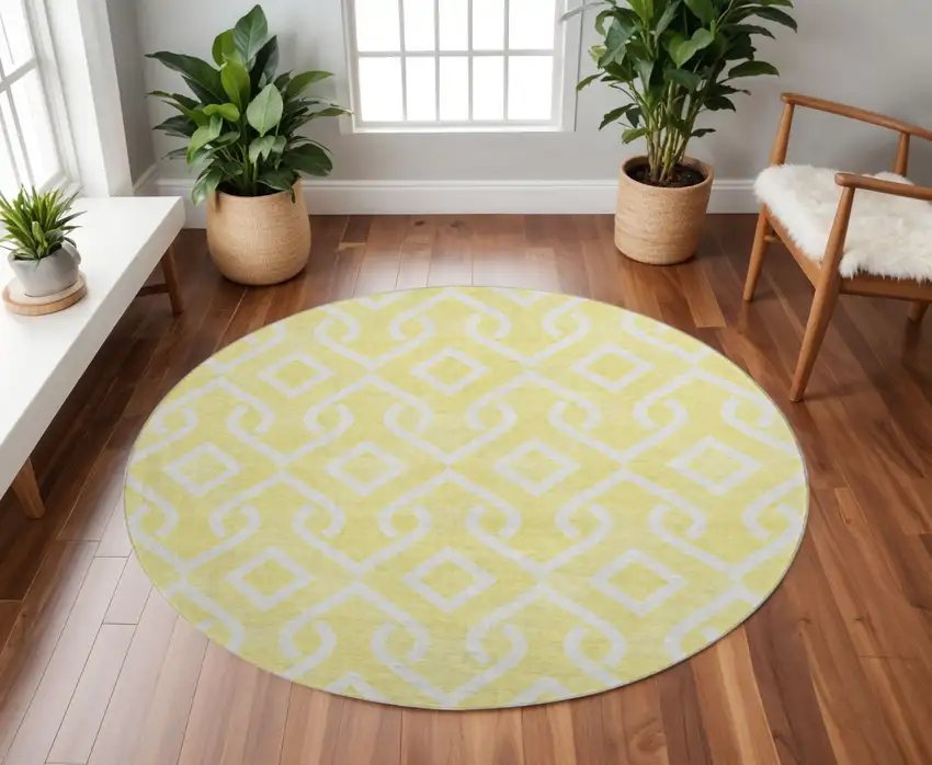 8' Yellow And Ivory Geometric Washable Round Rug With UV Protection Photo 2