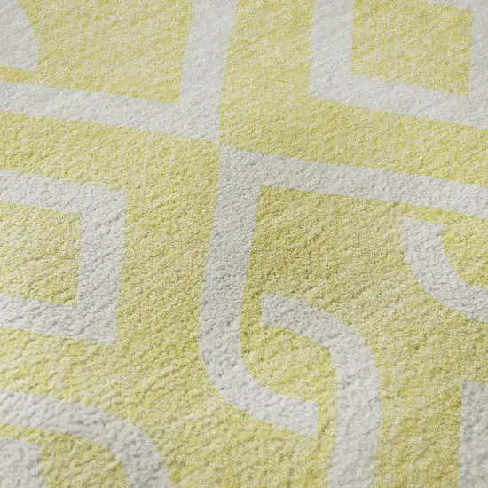 8' Yellow And Ivory Geometric Washable Round Rug With UV Protection Photo 9