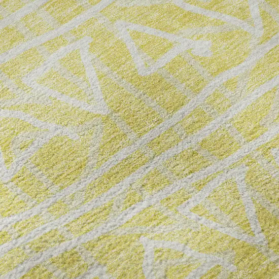 8' Yellow And Ivory Geometric Washable Round Rug With UV Protection Photo 9
