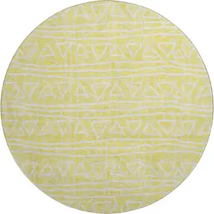 Photo of 8' Yellow And Ivory Geometric Washable Round Rug With UV Protection