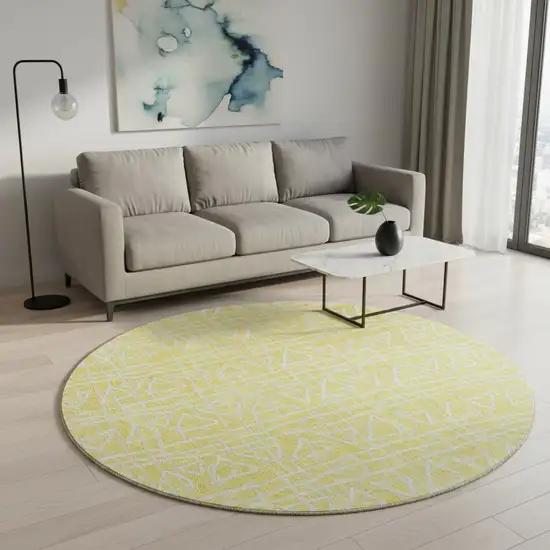 8' Yellow And Ivory Geometric Washable Round Rug With UV Protection Photo 2