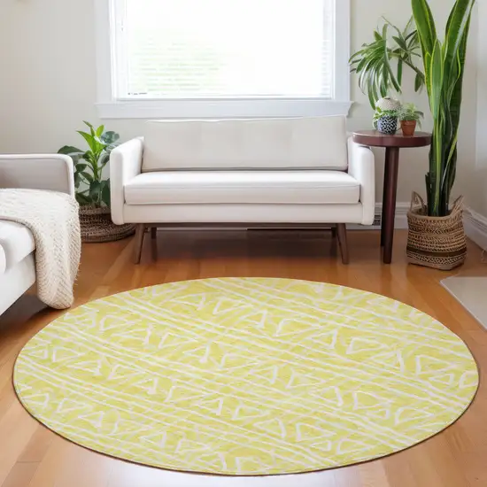8' Yellow And Ivory Geometric Washable Round Rug With UV Protection Photo 5