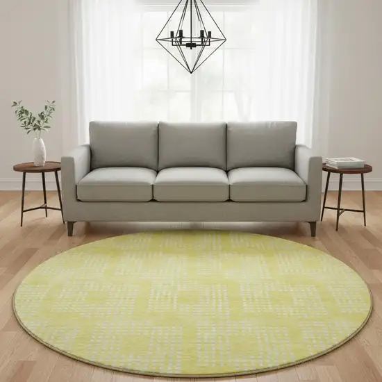 8' Yellow And Ivory Geometric Washable Round Rug With UV Protection Photo 2