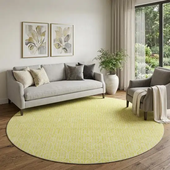 8' Yellow And Ivory Geometric Washable Round Rug With UV Protection Photo 1