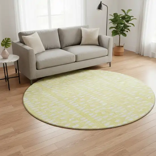 8' Yellow And Ivory Geometric Washable Round Rug With UV Protection Photo 2