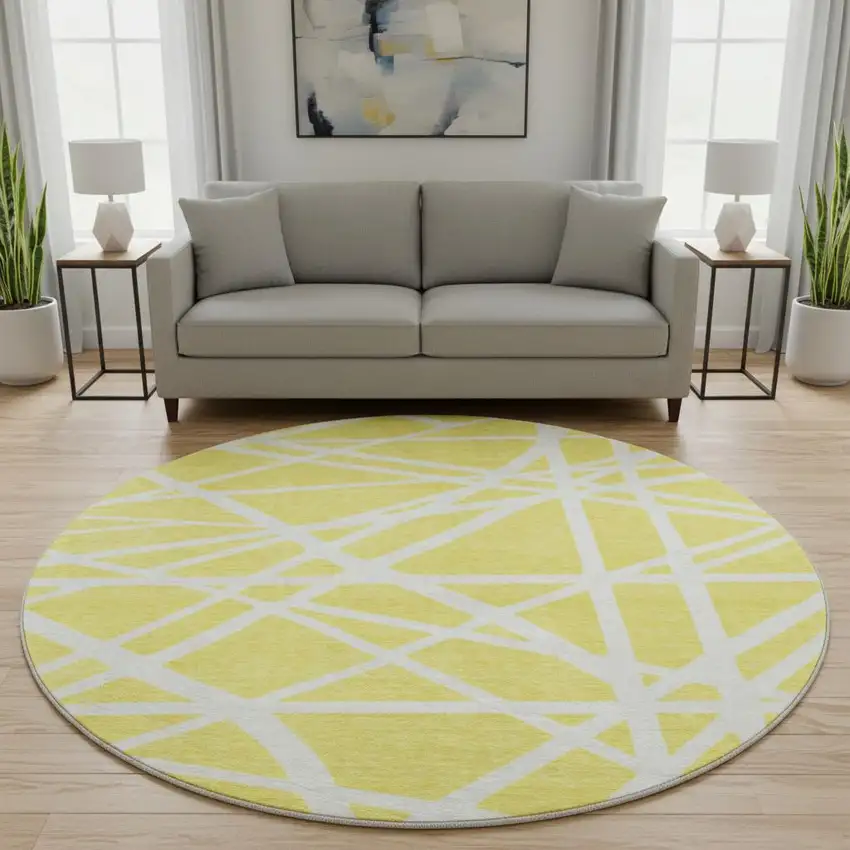 8' Yellow And Ivory Geometric Washable Round Rug With UV Protection Photo 2