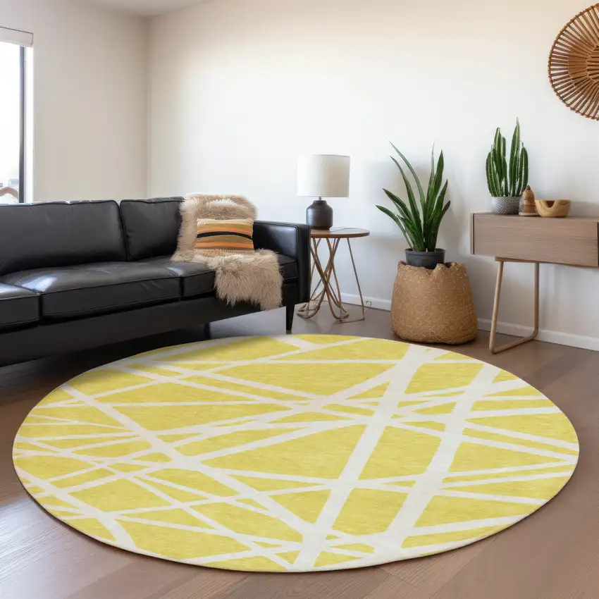 8' Yellow And Ivory Geometric Washable Round Rug With UV Protection Photo 4