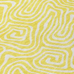 Photo of 8' Yellow And Ivory Round Abstract Washable Indoor Outdoor Area Rug