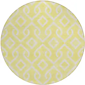 Photo of 8' Yellow And Ivory Round Geometric Washable Indoor Outdoor Area Rug