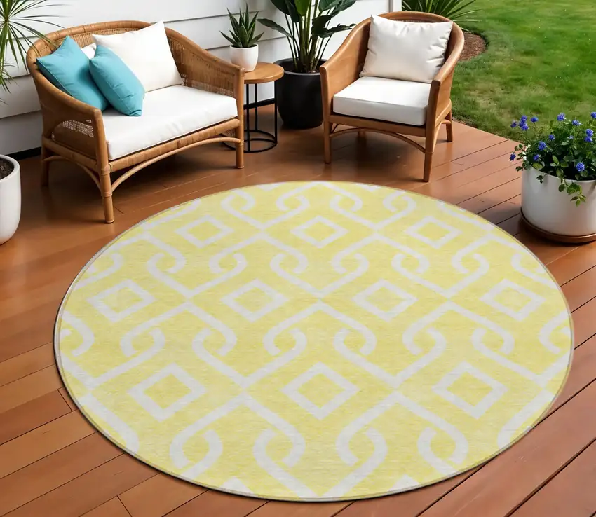 8' Yellow And Ivory Round Geometric Washable Indoor Outdoor Area Rug Photo 1