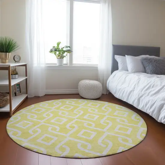 8' Yellow And Ivory Round Geometric Washable Indoor Outdoor Area Rug Photo 6