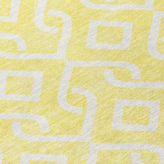 8' Yellow And Ivory Round Geometric Washable Indoor Outdoor Area Rug Photo 7