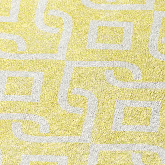 8' Yellow And Ivory Round Geometric Washable Indoor Outdoor Area Rug Photo 7