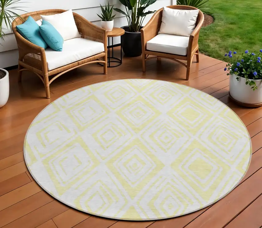 8' Yellow And Ivory Round Geometric Washable Indoor Outdoor Area Rug Photo 1