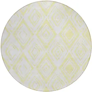 Photo of 8' Yellow And Ivory Round Geometric Washable Indoor Outdoor Area Rug