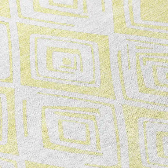 8' Yellow And Ivory Round Geometric Washable Indoor Outdoor Area Rug Photo 4
