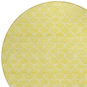 Photo of 8' Yellow And Ivory Round Geometric Washable Indoor Outdoor Area Rug